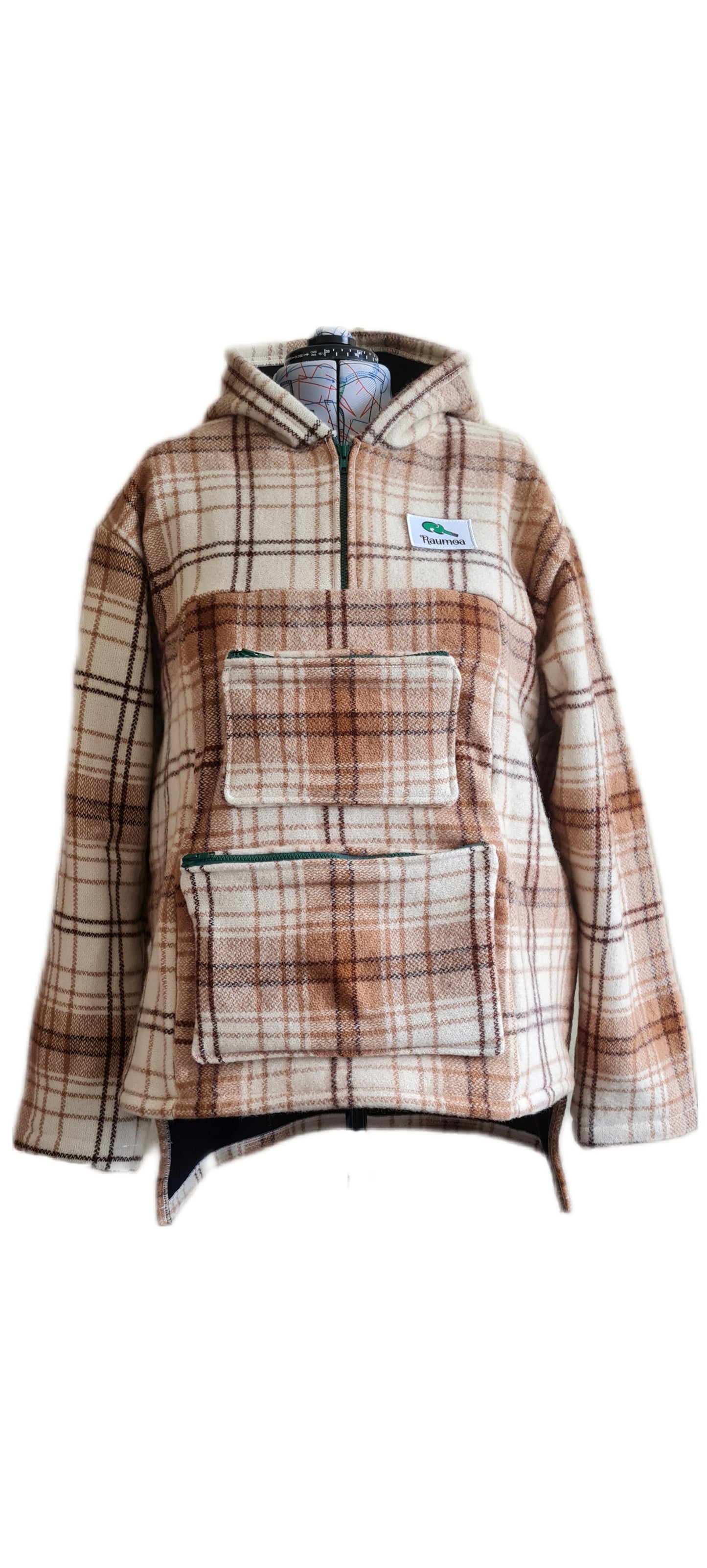Explore the great outdoors in the distinctive checked brown/white Raumoa Wool Anorak Jacket – a perfect blend of style and functionality