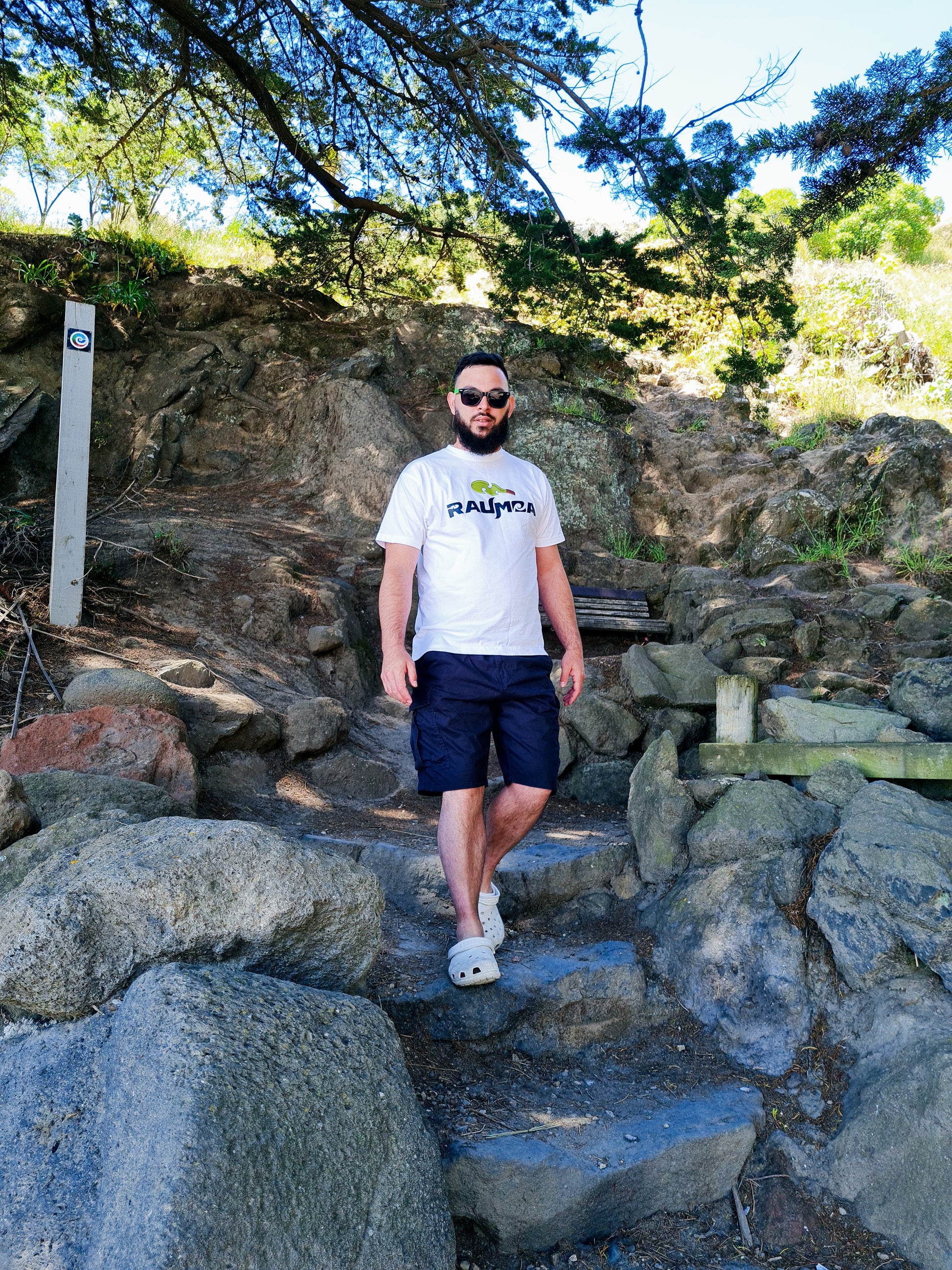 "Unique Maori Streetwear white T-shirt showcasing contemporary Maori designs and cultural flair. This Maori apparel piece seamlessly blends tradition with modern style, making it a distinctive addition to your wardrobe. Elevate your streetwear with this culturally inspired fashion statement.  [Image: Front View of color white t shirt.]