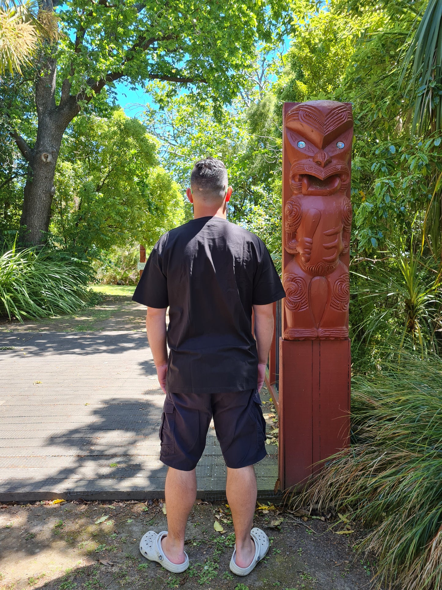 Raumoa Black-Tshirt from a maori clothing brand, showcasing cultural design and style. [Image: back View of black t shirt.]