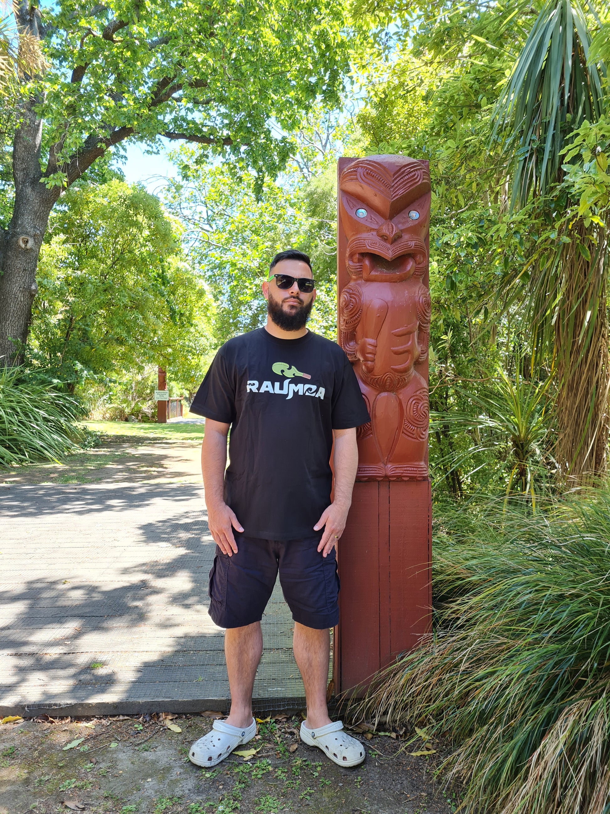 the Maori-themed black T-shirt Elevate your style with this T-shirt embodying the essence of Maori culture, showcasing distinctive Maori clothing, contemporary Maori wear, and intricate Maori design clothing. A harmonious blend of tradition and fashion awaits in every stitch. [Image: front View of black t shirt.]