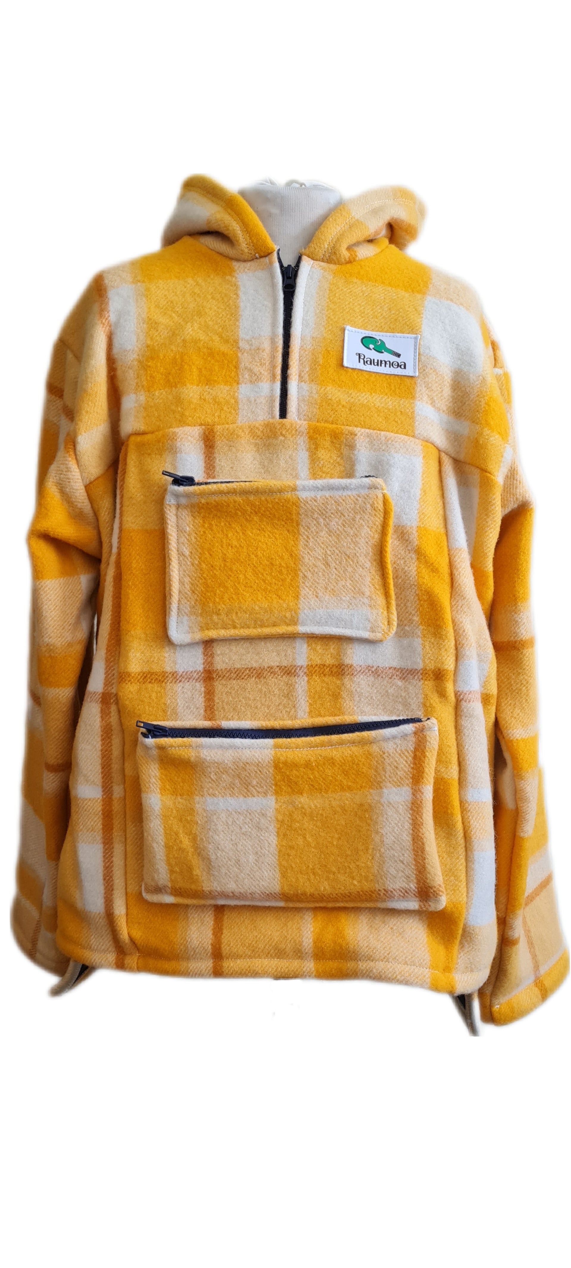 Stand out in the wild with the Checked Yellow Raumoa Wool Anorak Jacket, a vibrant bush jacket that combines style and functionality for your outdoor adventures.