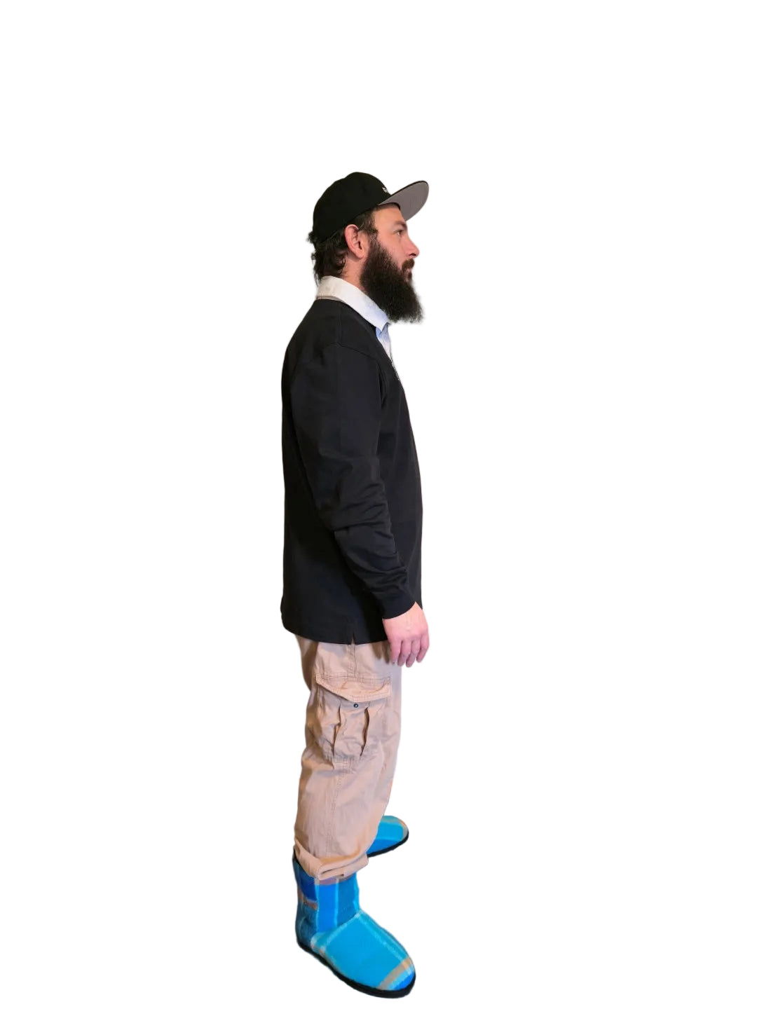 A man wearing a black long-sleeve rugby shirt, beige cargo pants, 